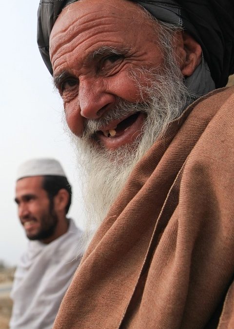 Old Muslim man missing teeth